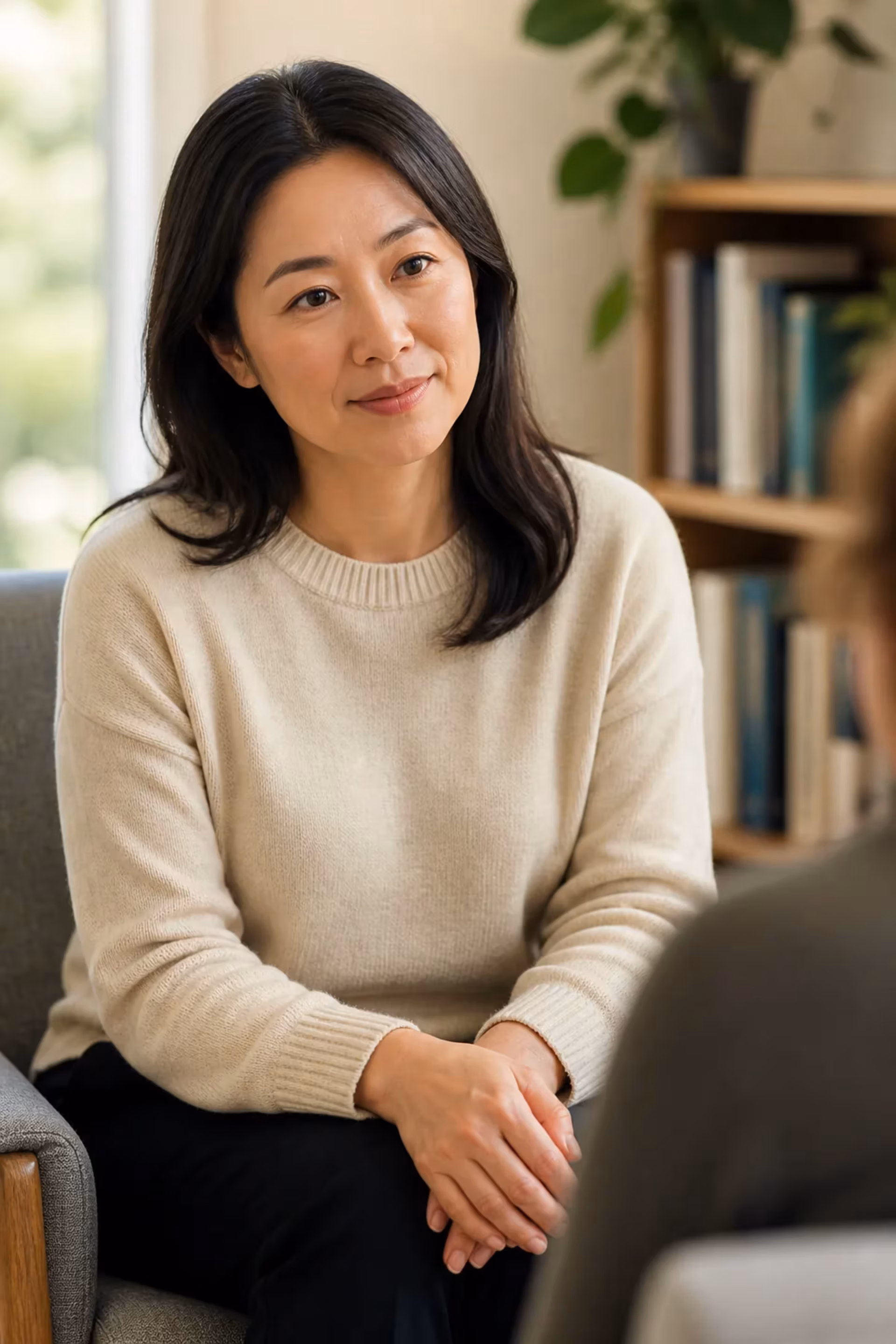 Licensed therapist facilitating with warm attentive presence