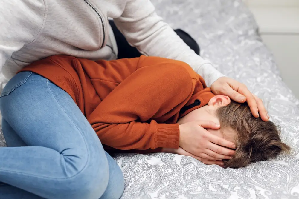 Person reflecting on trauma and healing