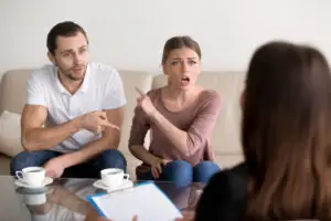 couple pointing fingers needing couples problems therapy counseling oakland
